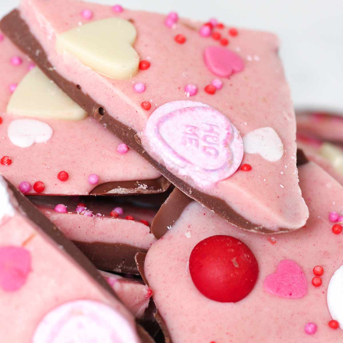 close up of pink valentines day chocolate bark pieces