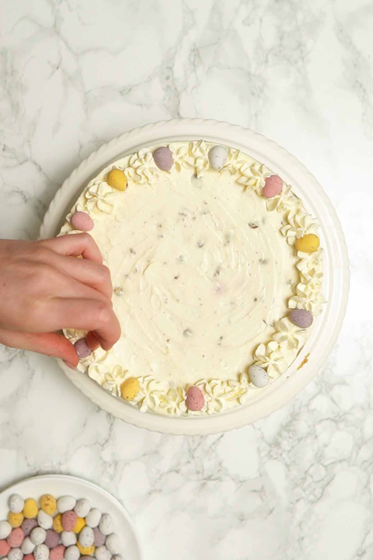 decorating cheesecake with cadbury mini eggs