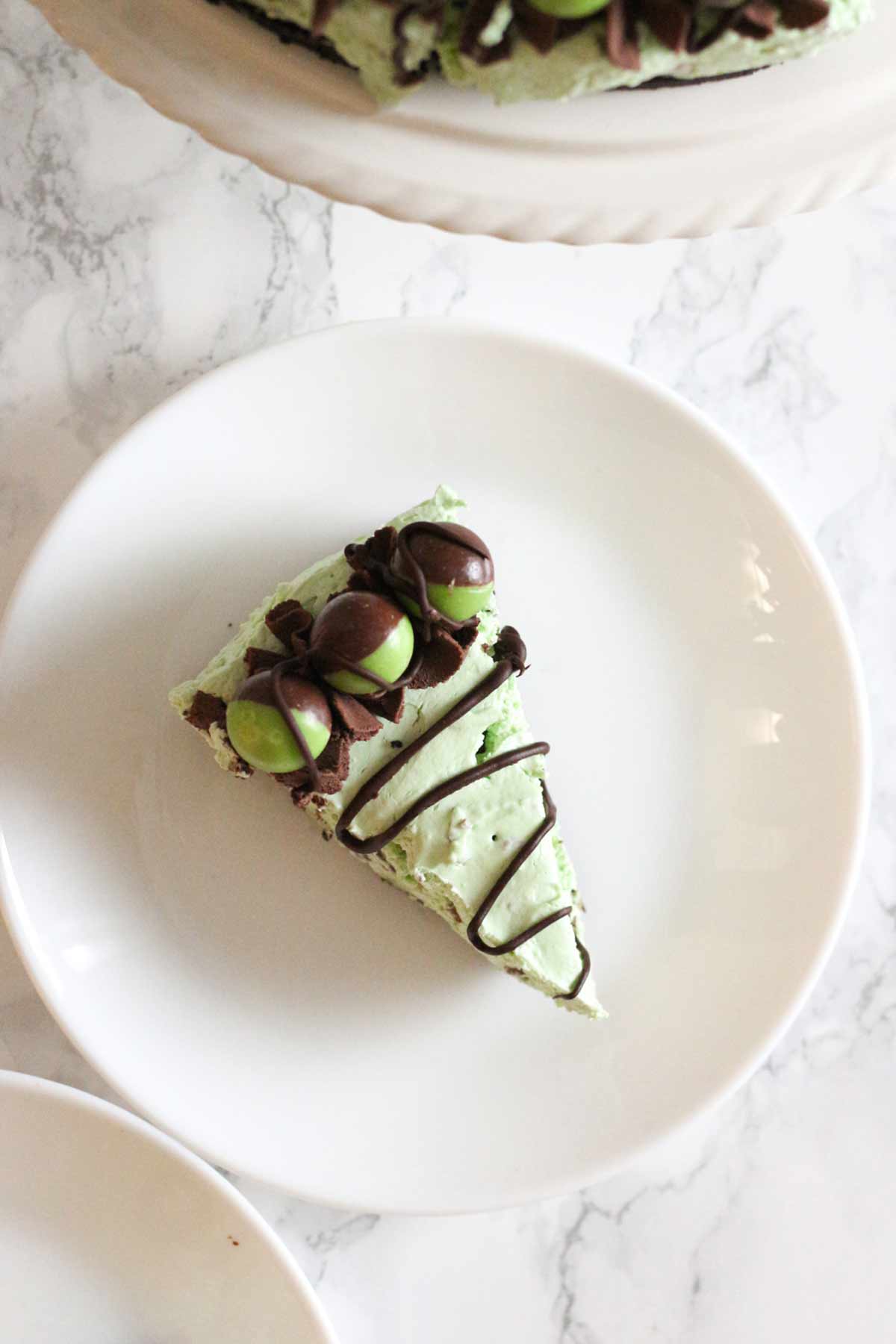overhead image of a slice of mint aero bubble cheesecake