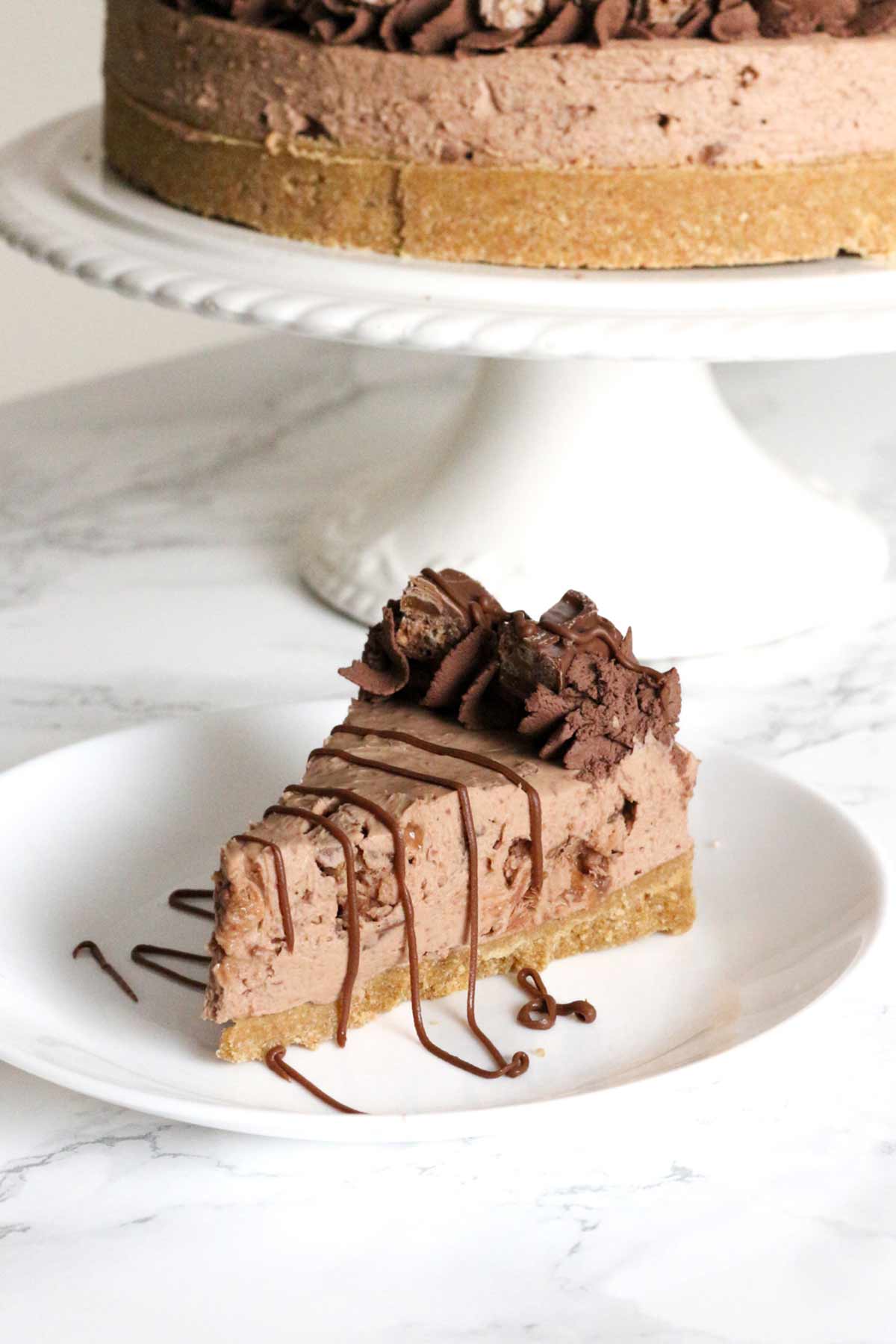 slice of toffee crisp cheesecake on a plate