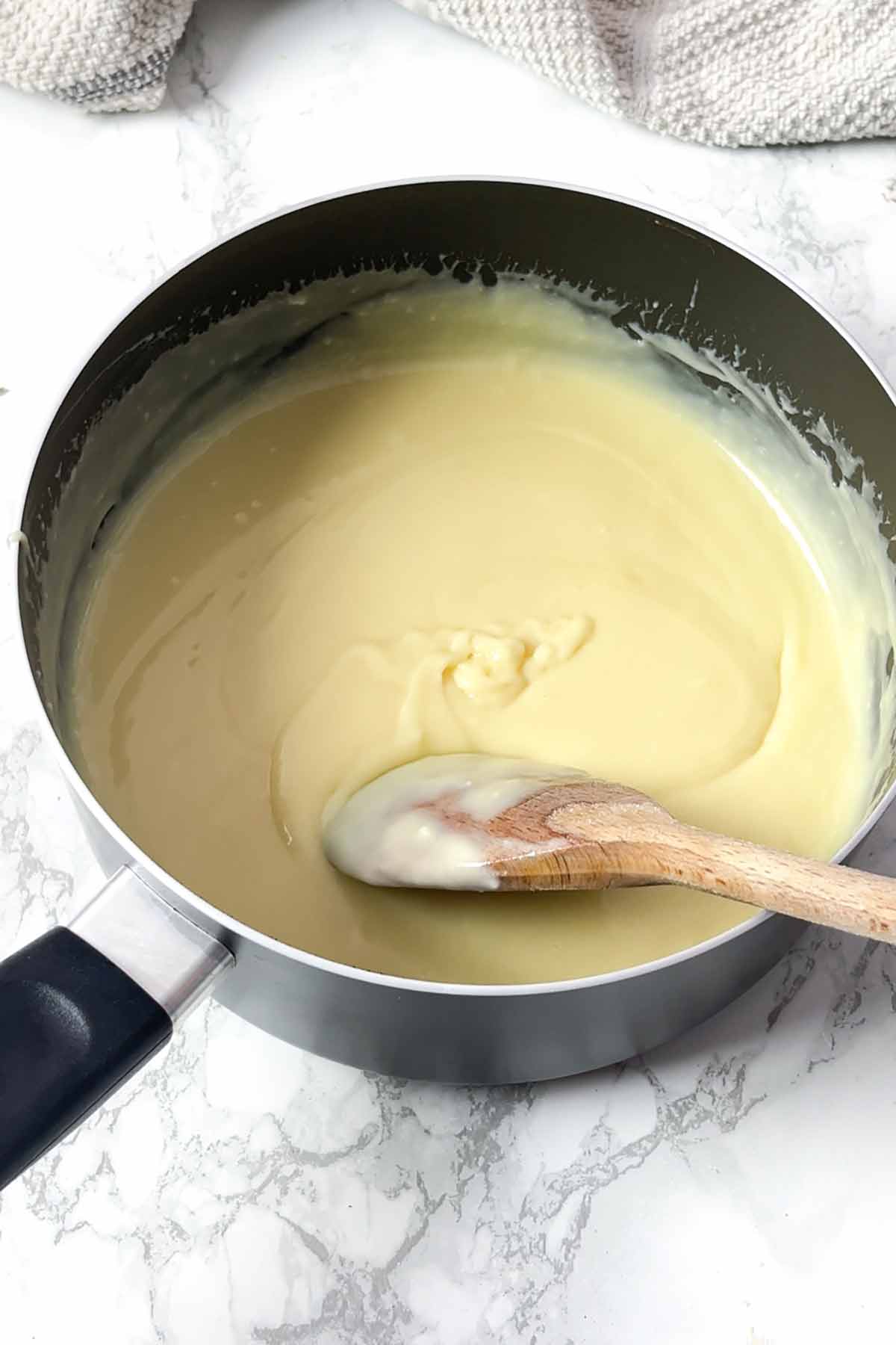 melted chocolate and condensed milk in a pan