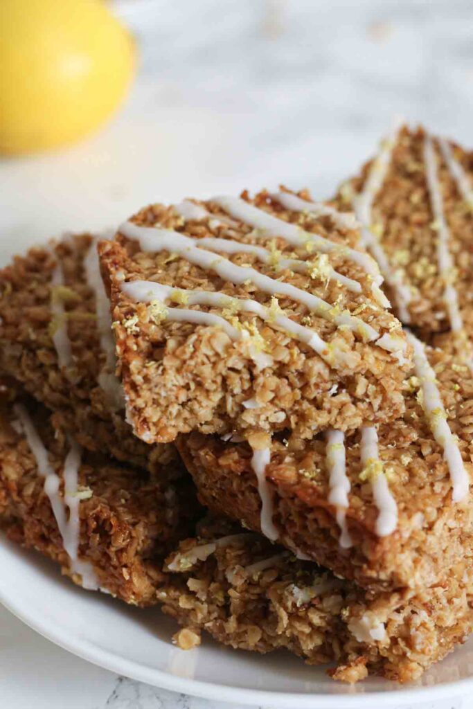 a pile of lemon drizzle flapjacks on a plate
