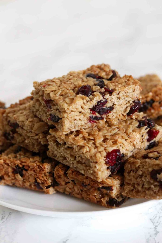 a plate full of dried cranberry flapjacks