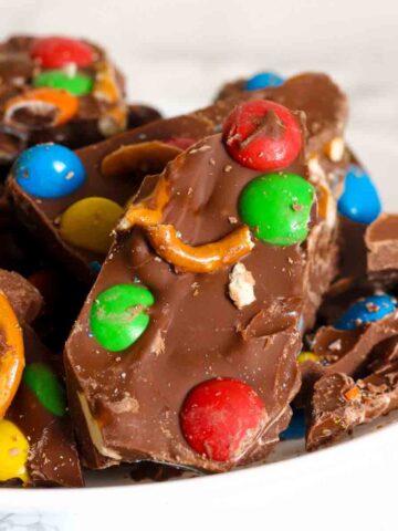 shards of m&m chocolate bark with pretzels