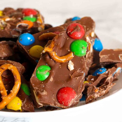 shards of m&m chocolate bark with pretzels