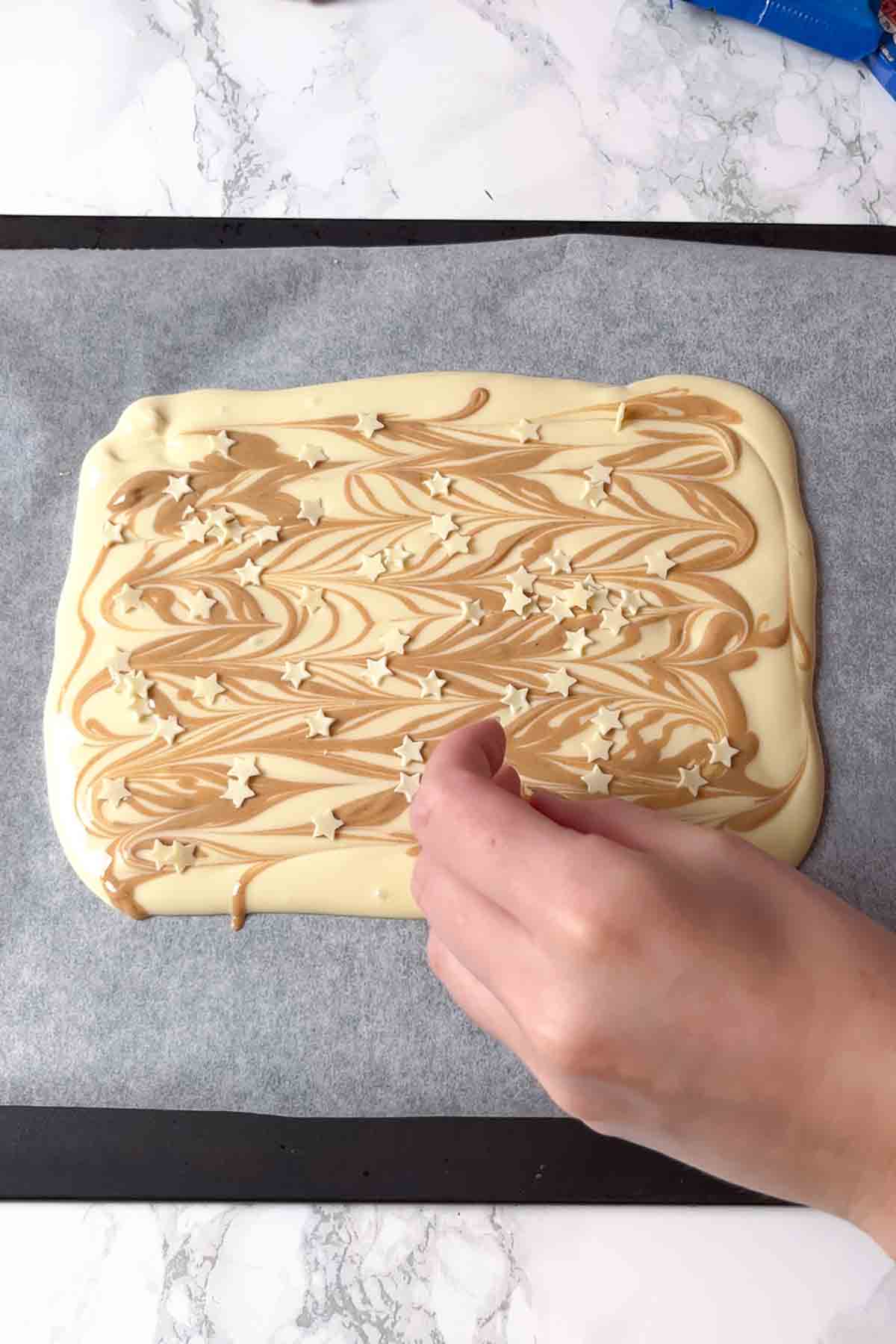 decorating the bark with star sprinkles