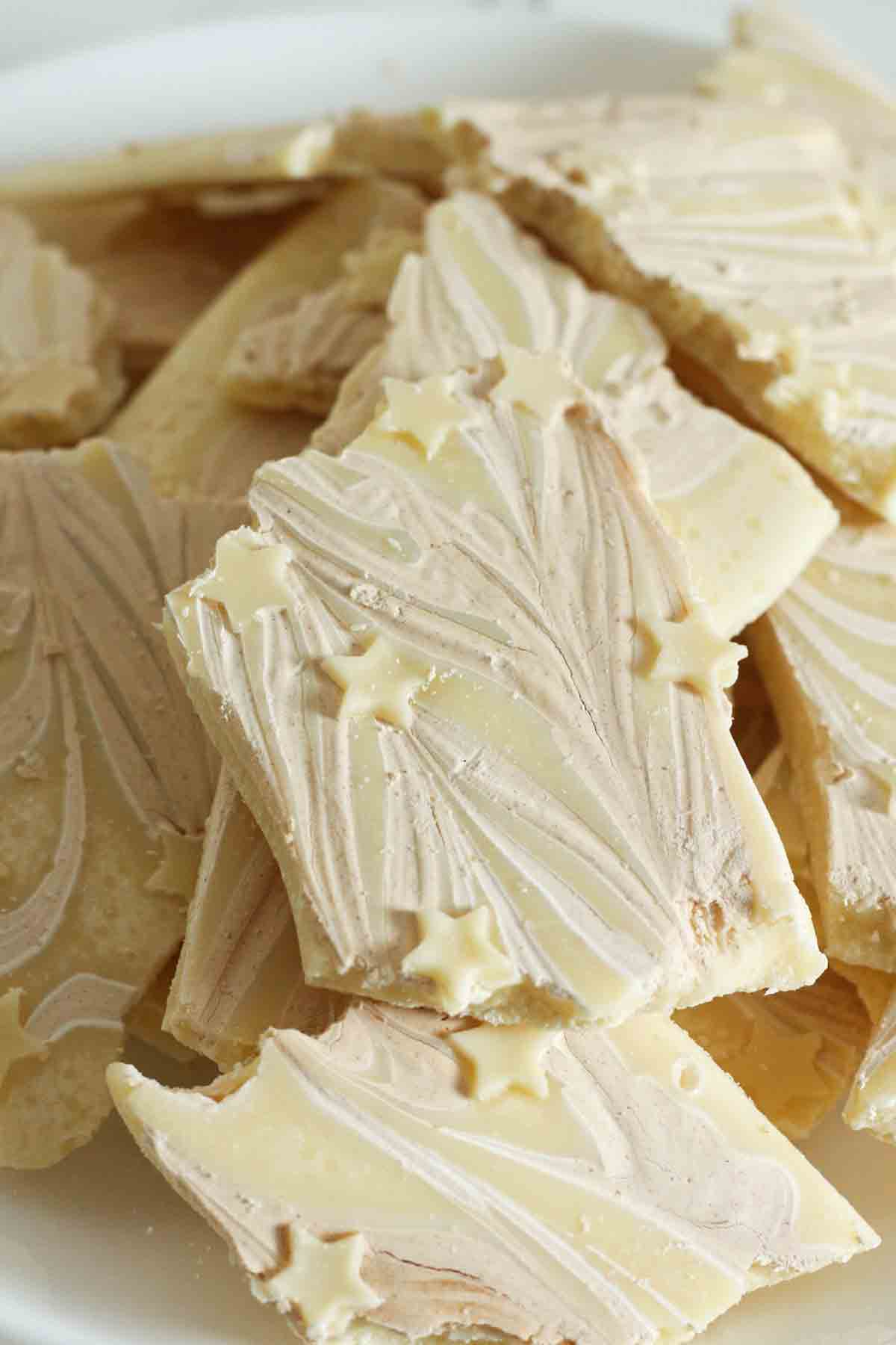 pile of white chocolate peanut butter bark on a plate