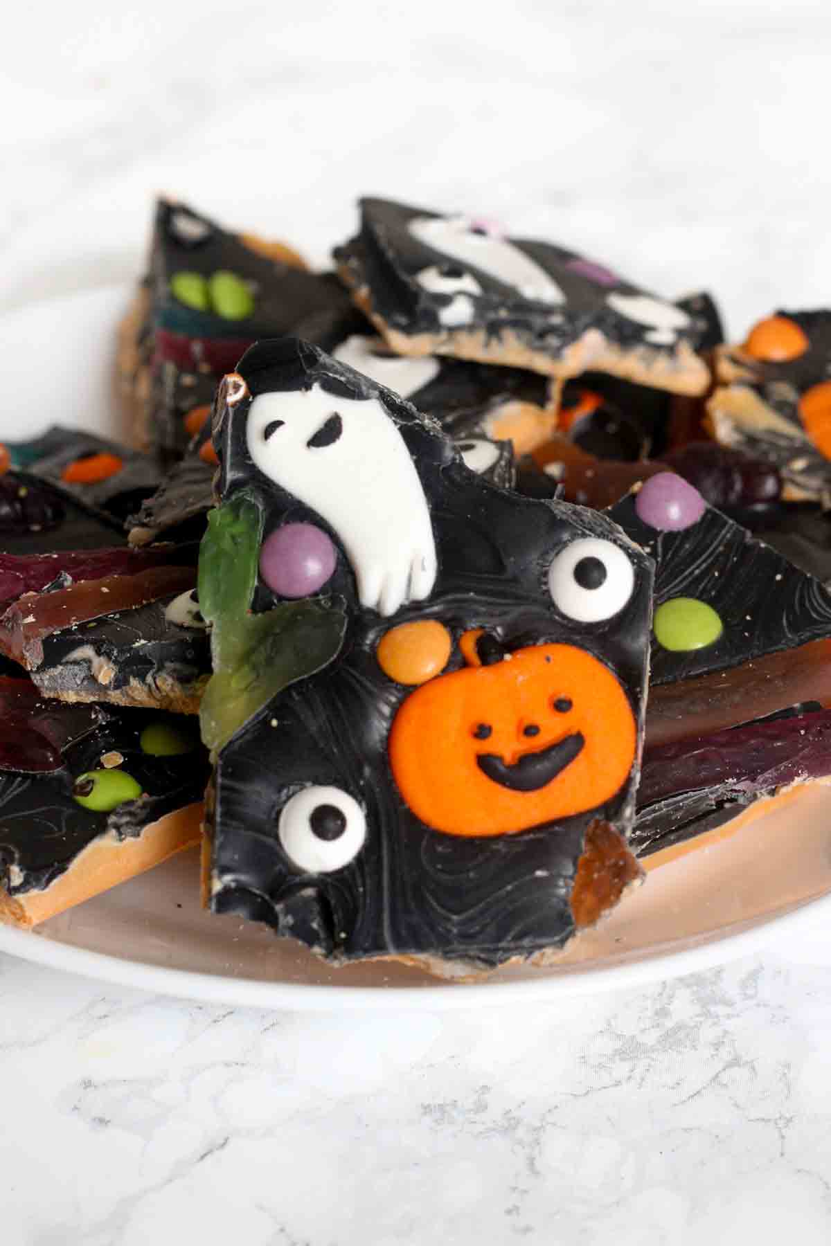 a plate full of spooky halloween bark shards