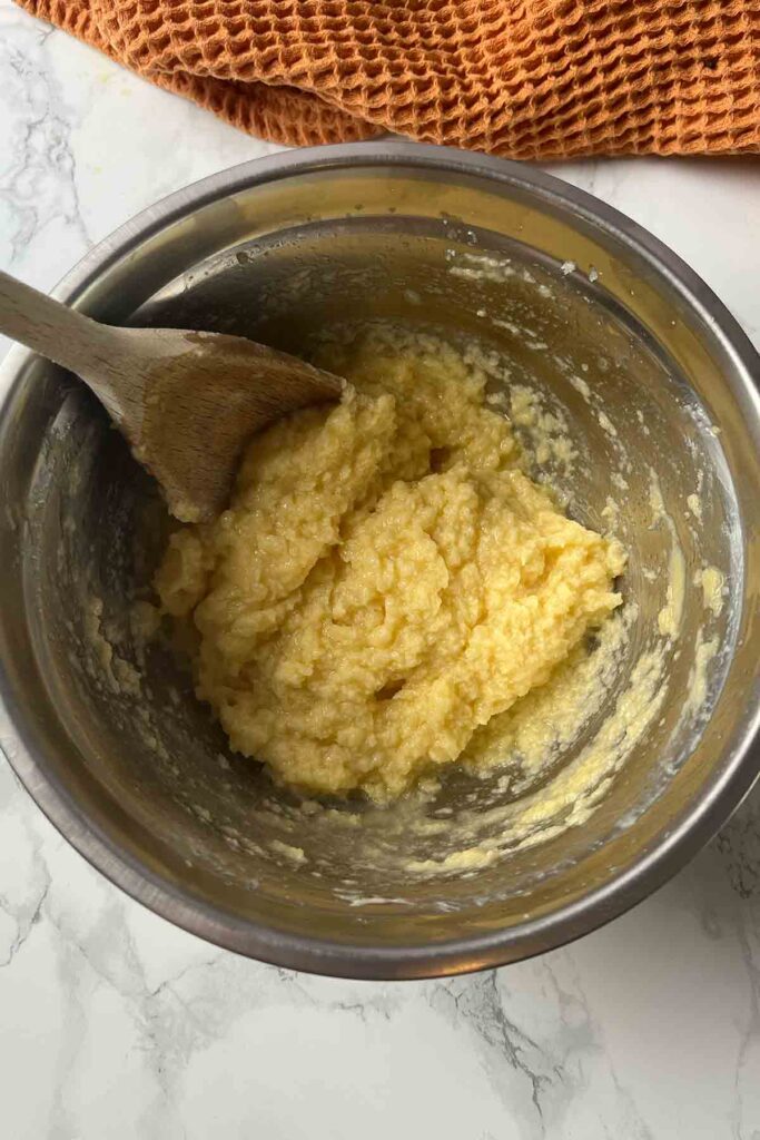 butter and sugar mixed with egg