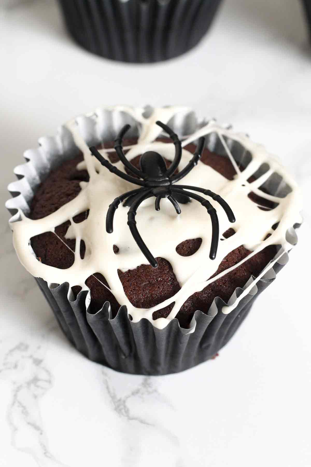 halloween chocolate marshmallow spider web muffins