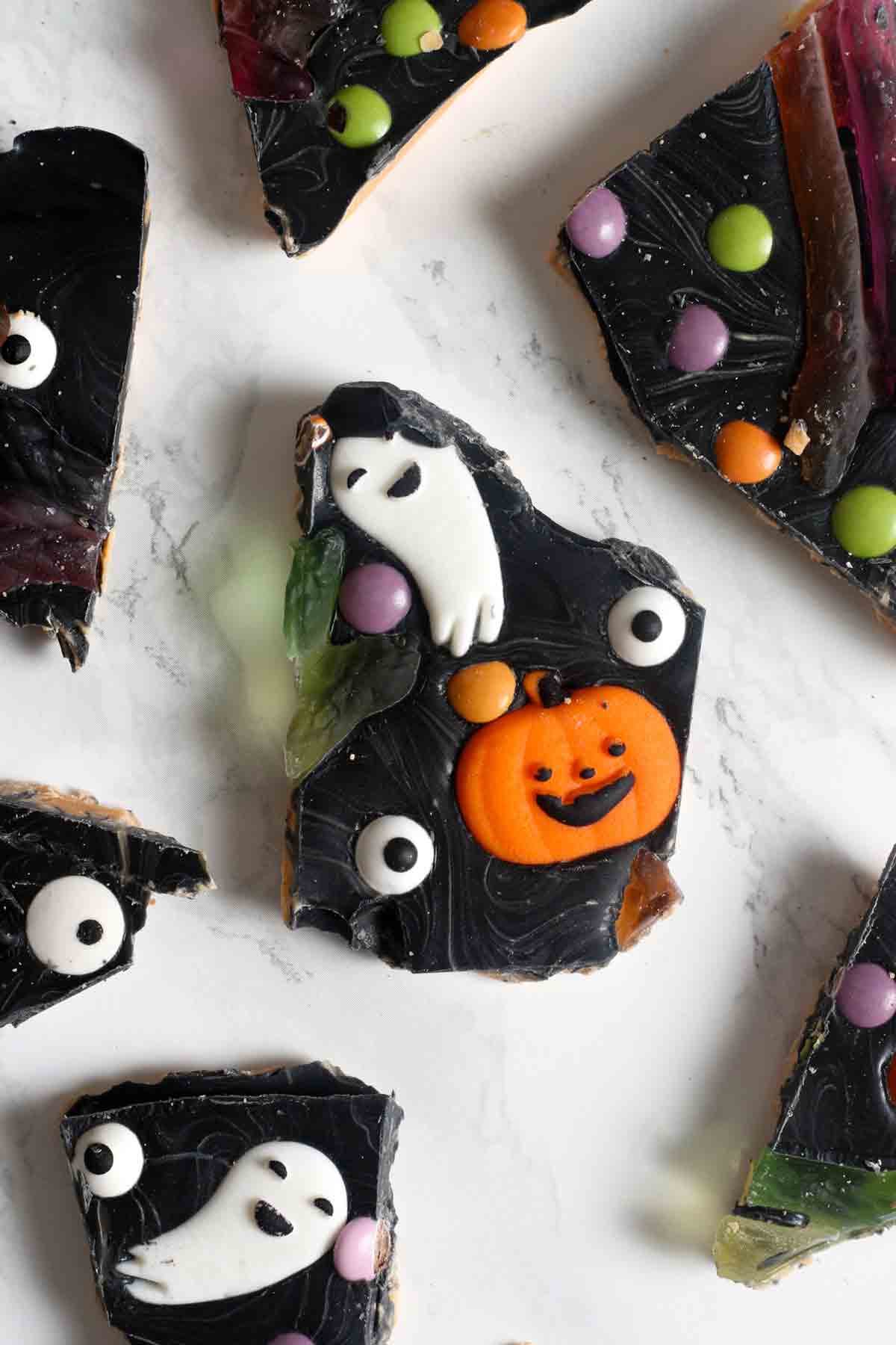 pieces of black and orange spooky chocolate bark