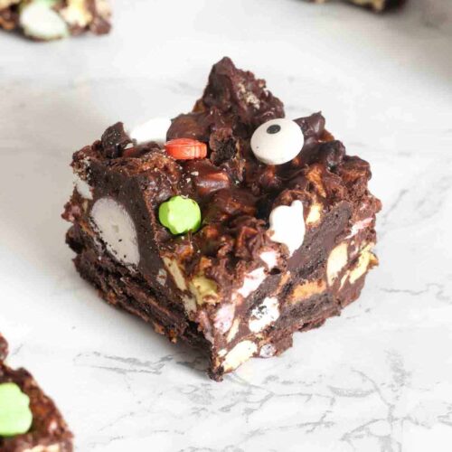 squares of halloween rocky road on a white worktop