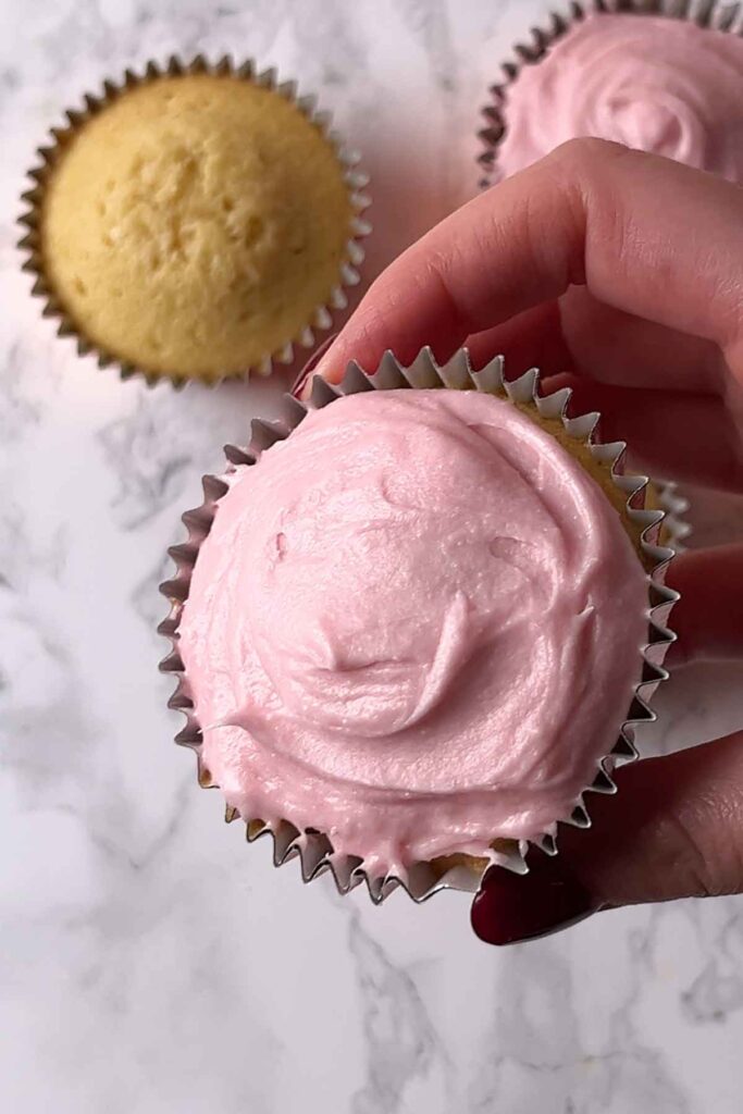 pink frosting on cupcakes