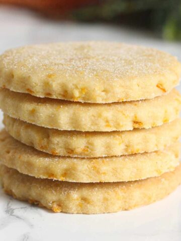 thumbnail image of a stack of orange shortbread biscuits
