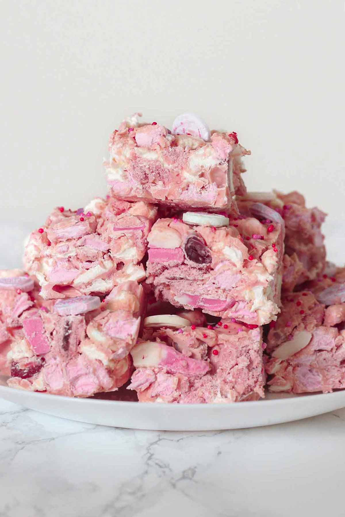 stack of valentines rocky road squares on a plate
