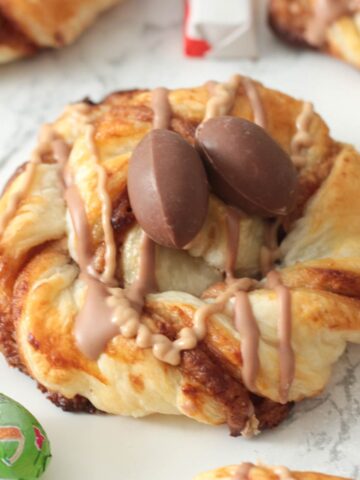kinder bueno puff pastry easter nests with chocolate eggs on top