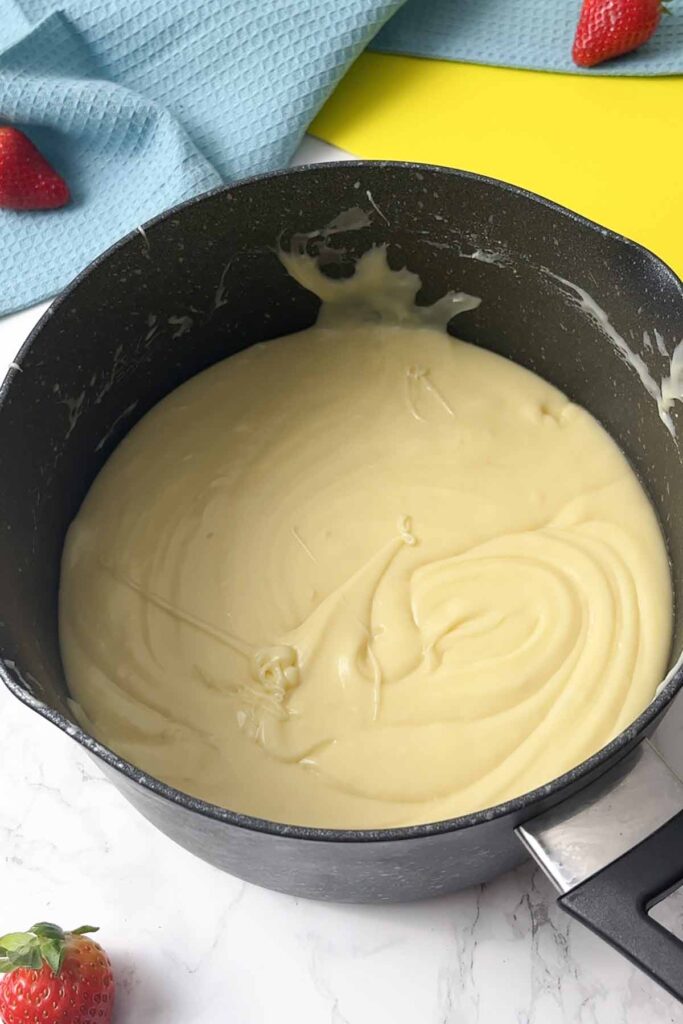 melted white choc and condensed milk in saucepan