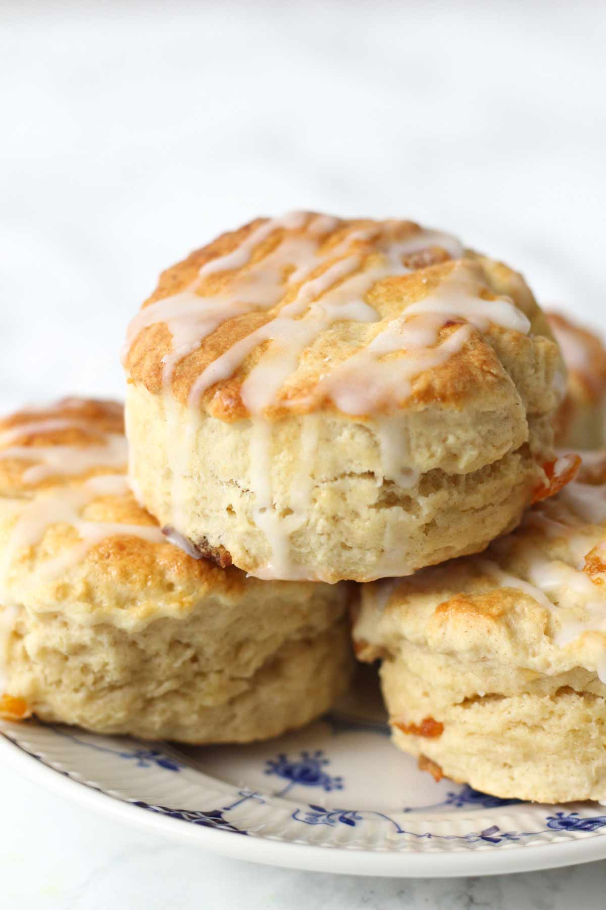 pile of dried apricot scones on a plate