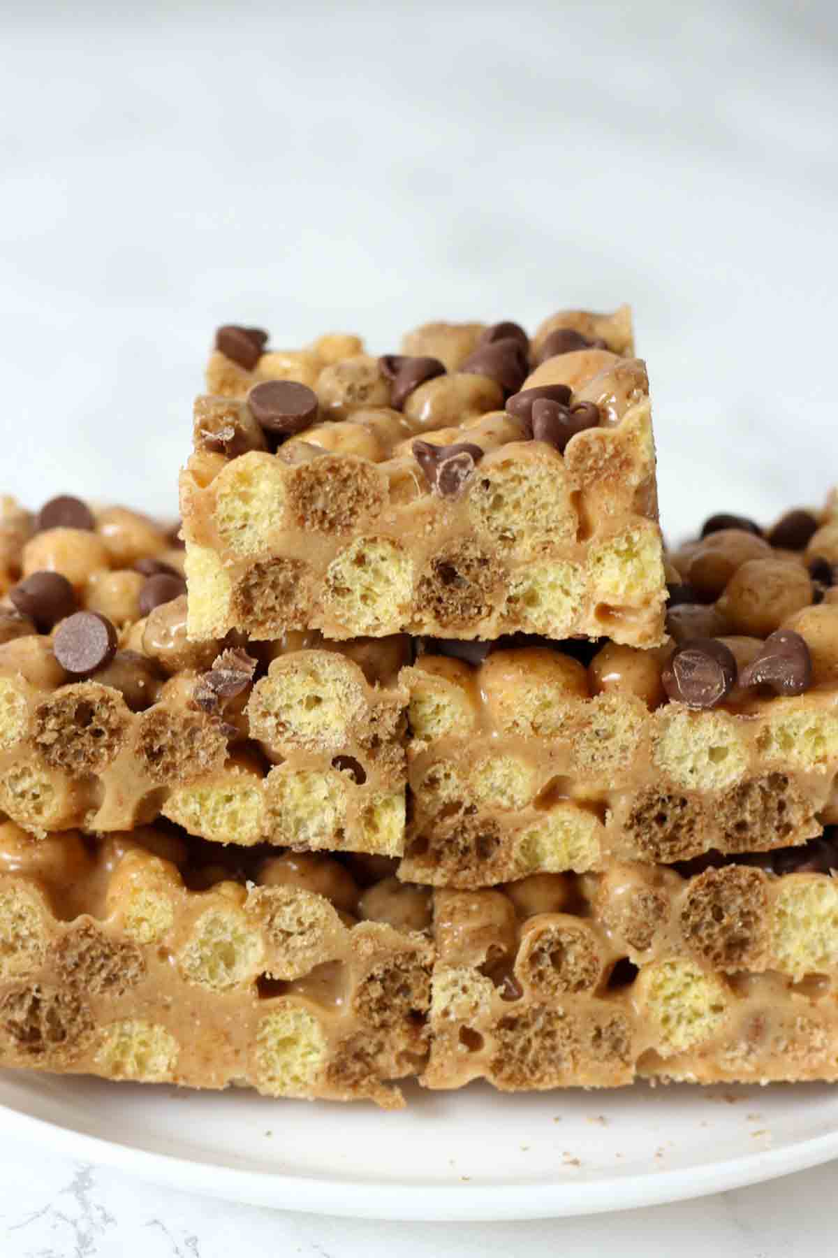plate full of crispy reeses peanut butter marshmallow treats