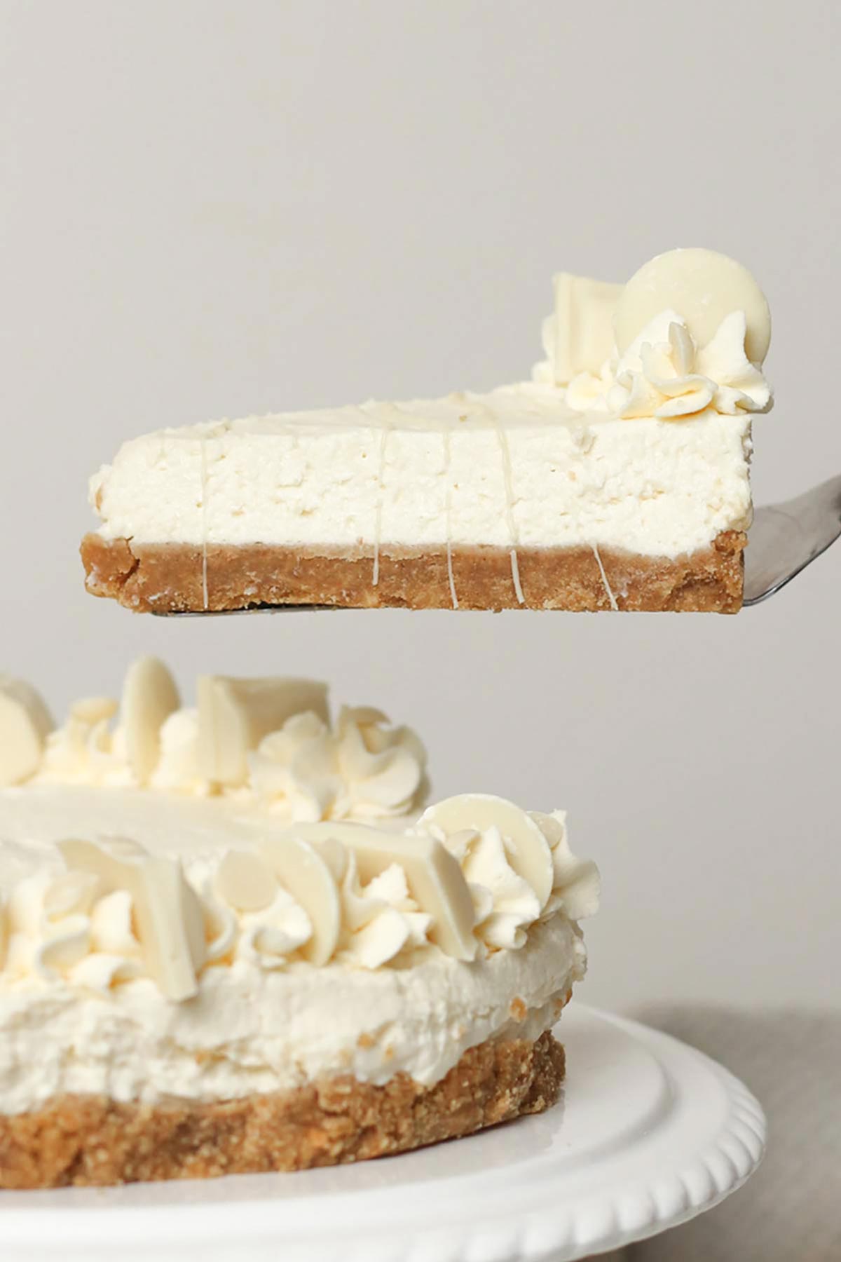 slice of milkybar cheesecake on a cake slice