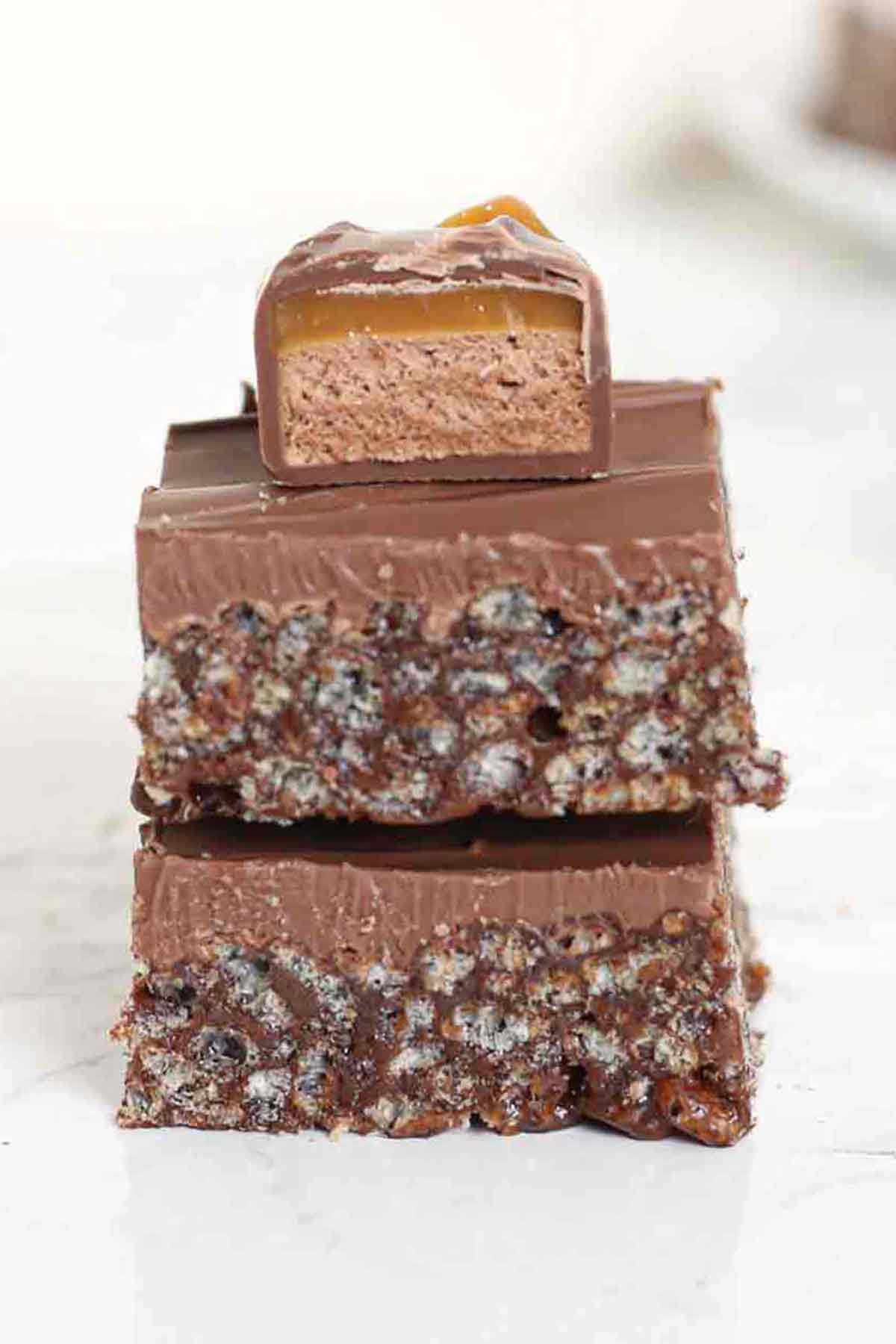 stack of 2 pieces of mars bar traybake slice