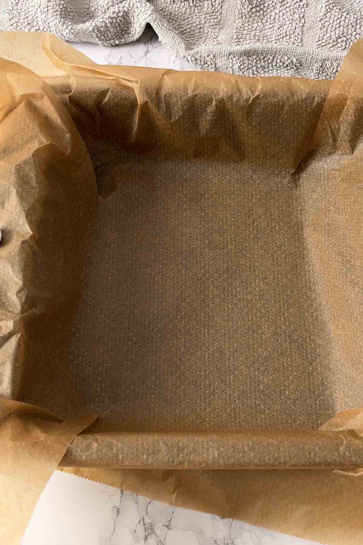 brownie tips 2 image of a lined 8x8 inch tin