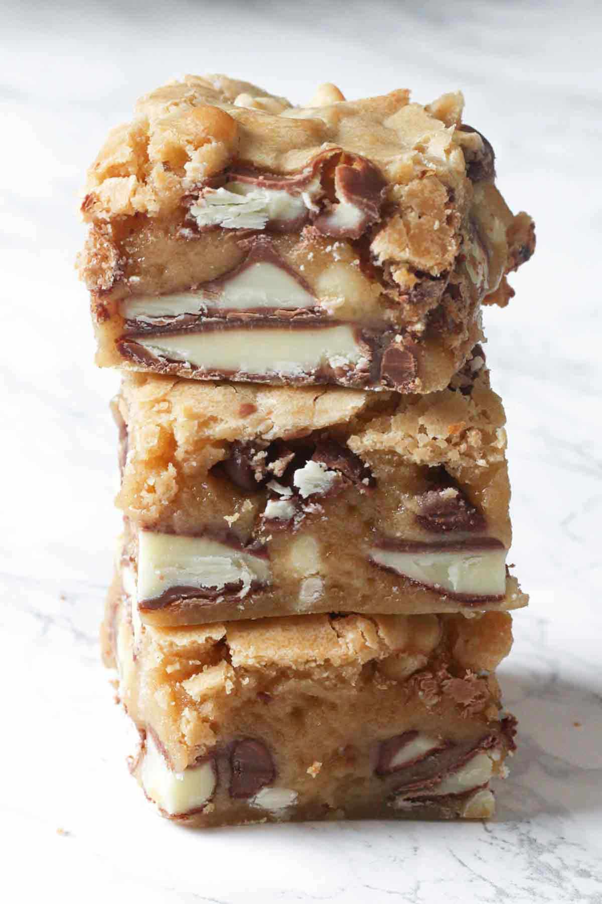 stack of 3 milk and white chocolate kinder blondies