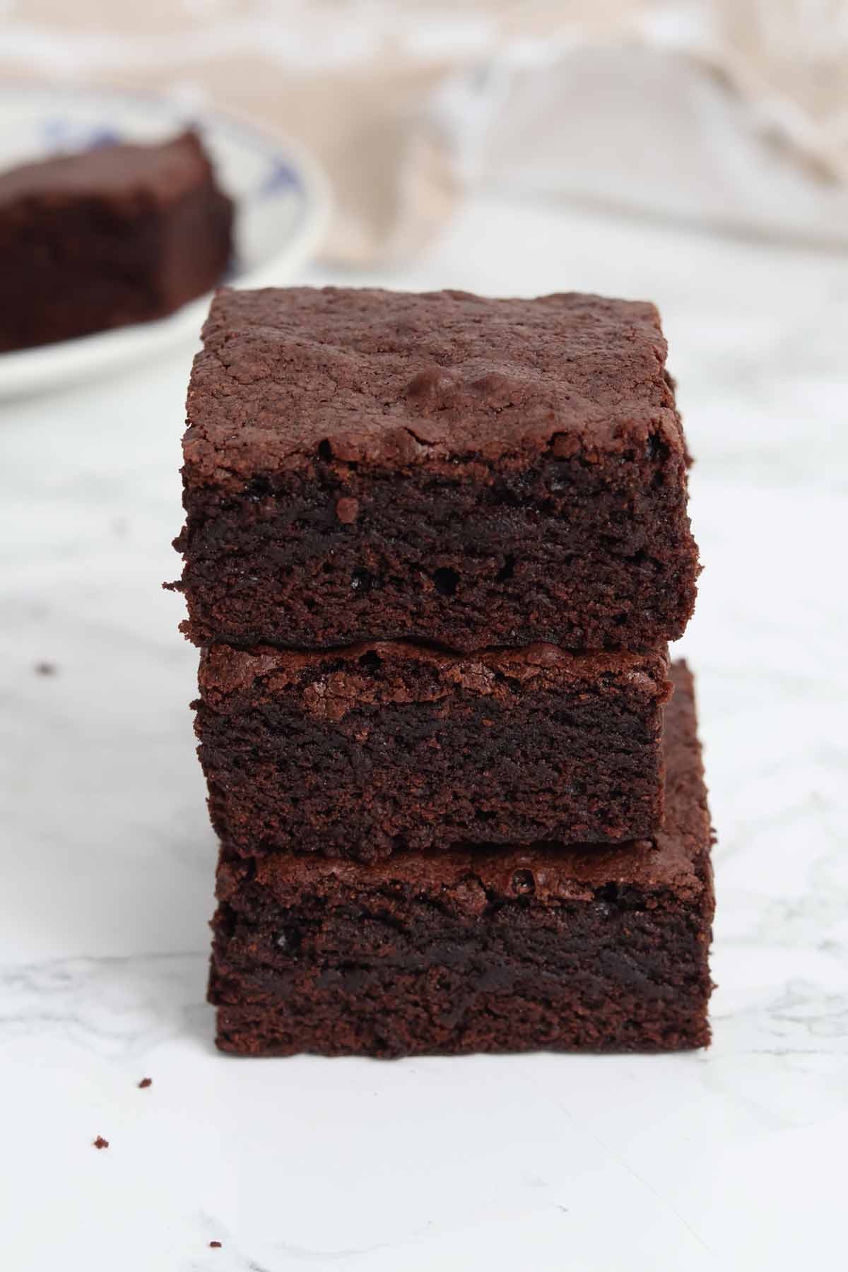 a stack of 3 cakey brownies