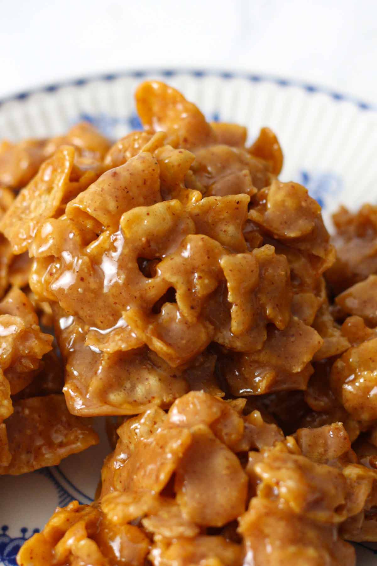 peanut butter cornflake candy piled on a plate