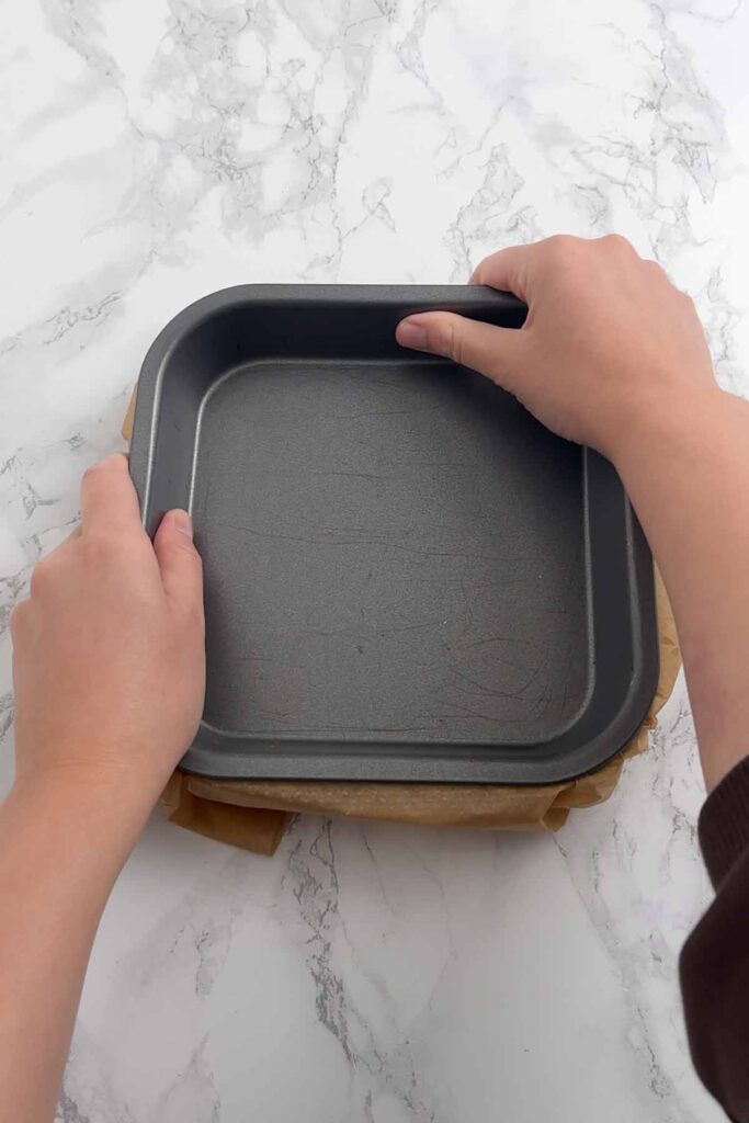 pressing a second tin on top