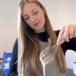 chloe with whisk in hand