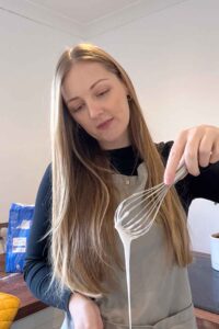 chloe with whisk in hand