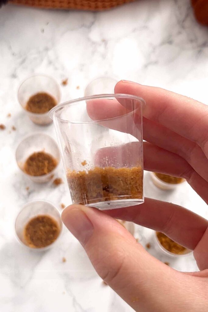 cookie base pressed into shot glasses