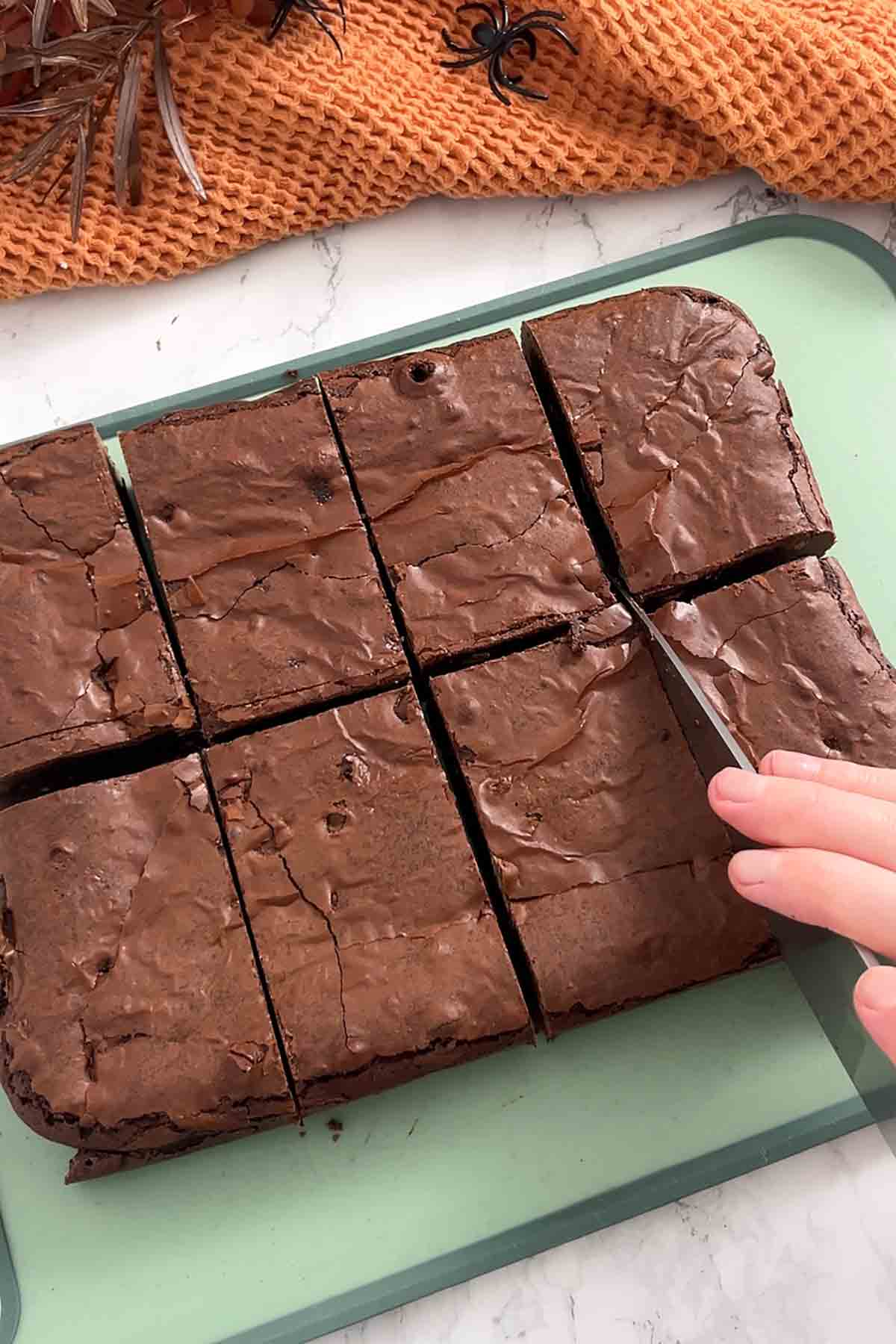 cutting the brownies into rectangles