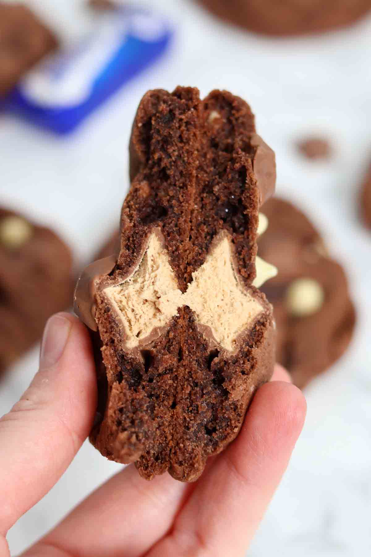 inside of chocolate cookies showing fun size milky way bar inside
