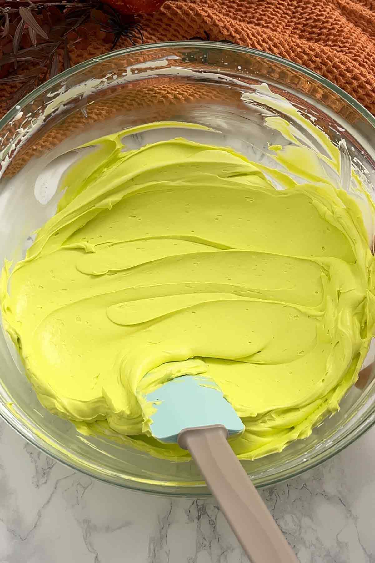 lime green cheeseake filling in a bowl