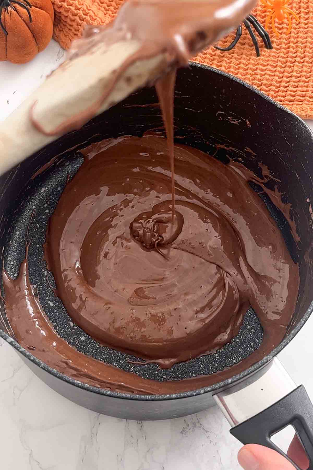 melted marshmallow mixture in a saucepan