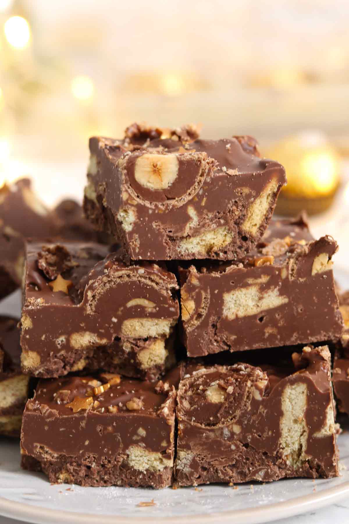 a plate full of slices of ferrero rocher tiffin traybake