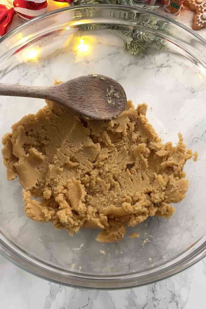 bowl of butter and sugars mixed together