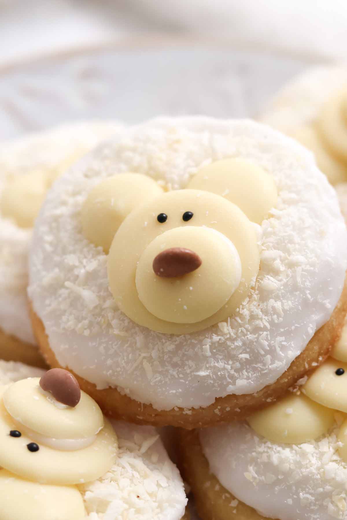 backlit image of polar bear cookies on a plate