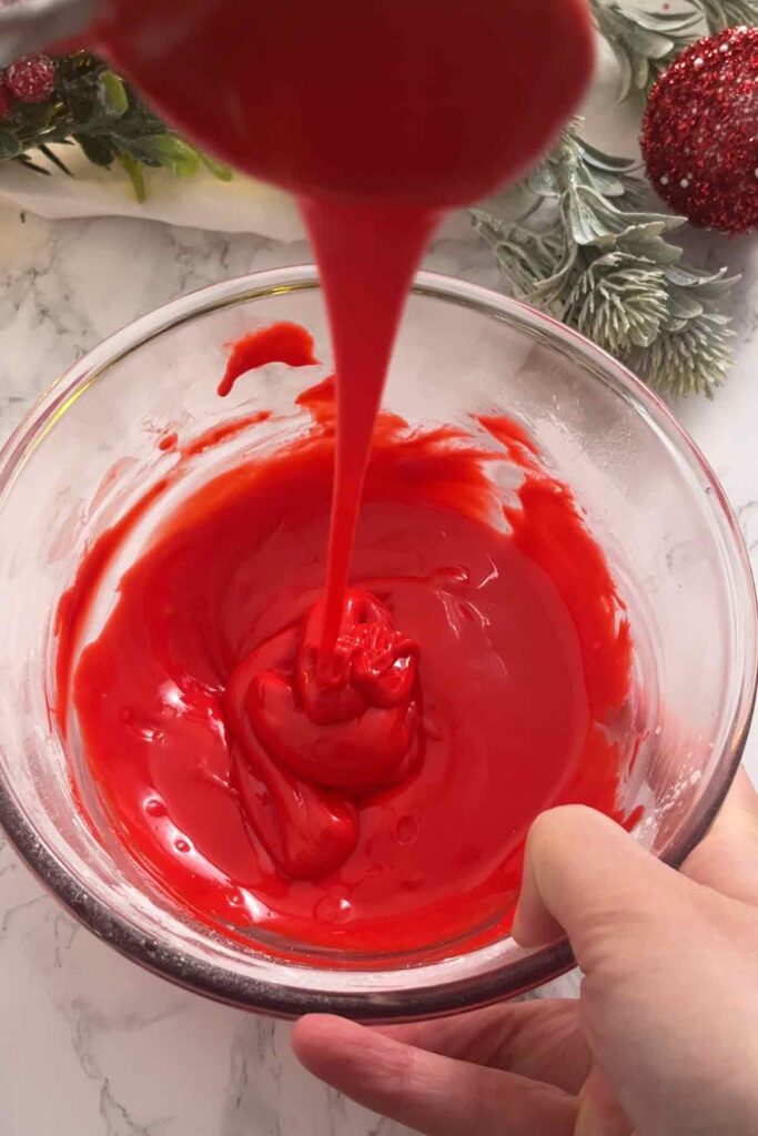 bowl of red glace icing