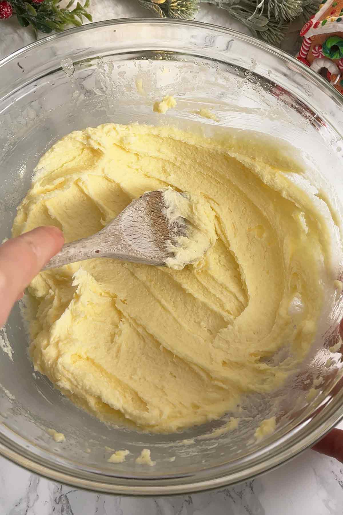 butter and sugar creamed together in a glass bowl