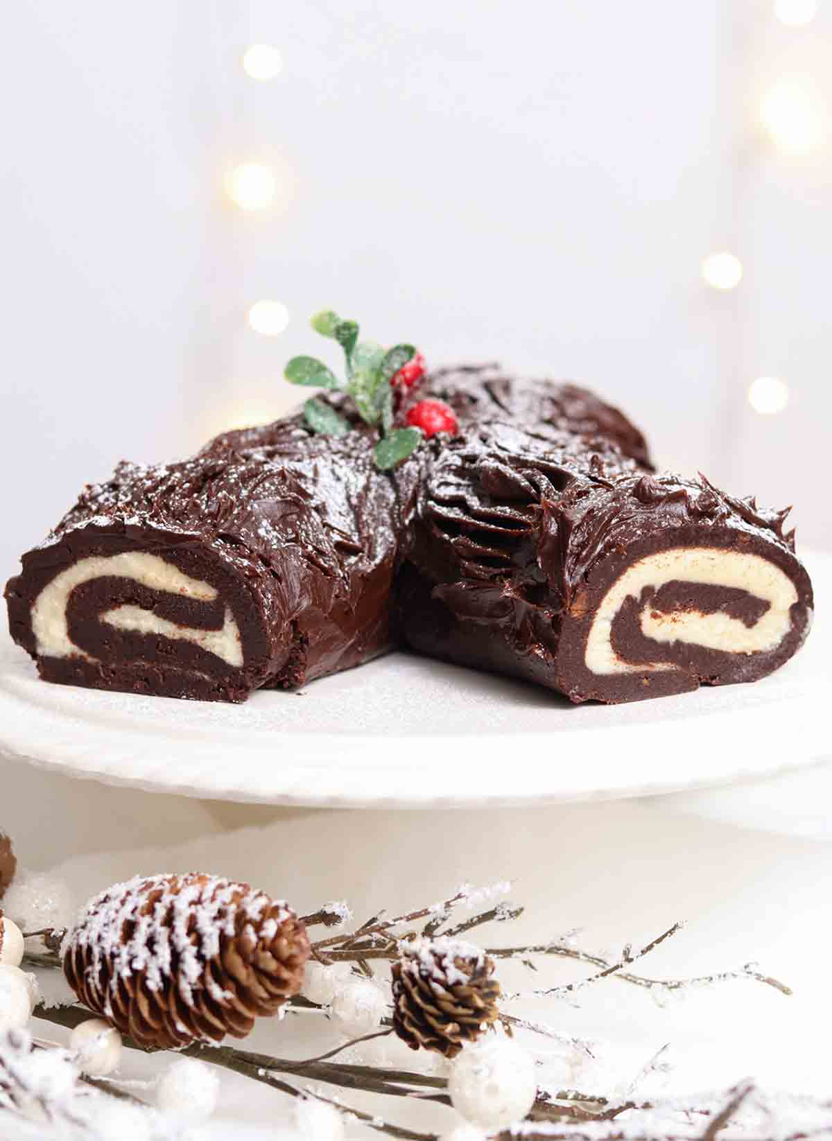 chocolate biscuit yule log on a cake stand