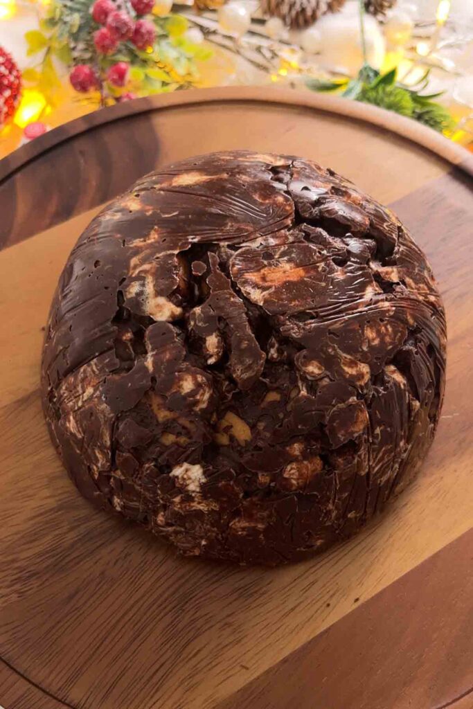 rocky road dome on a brown cake stand