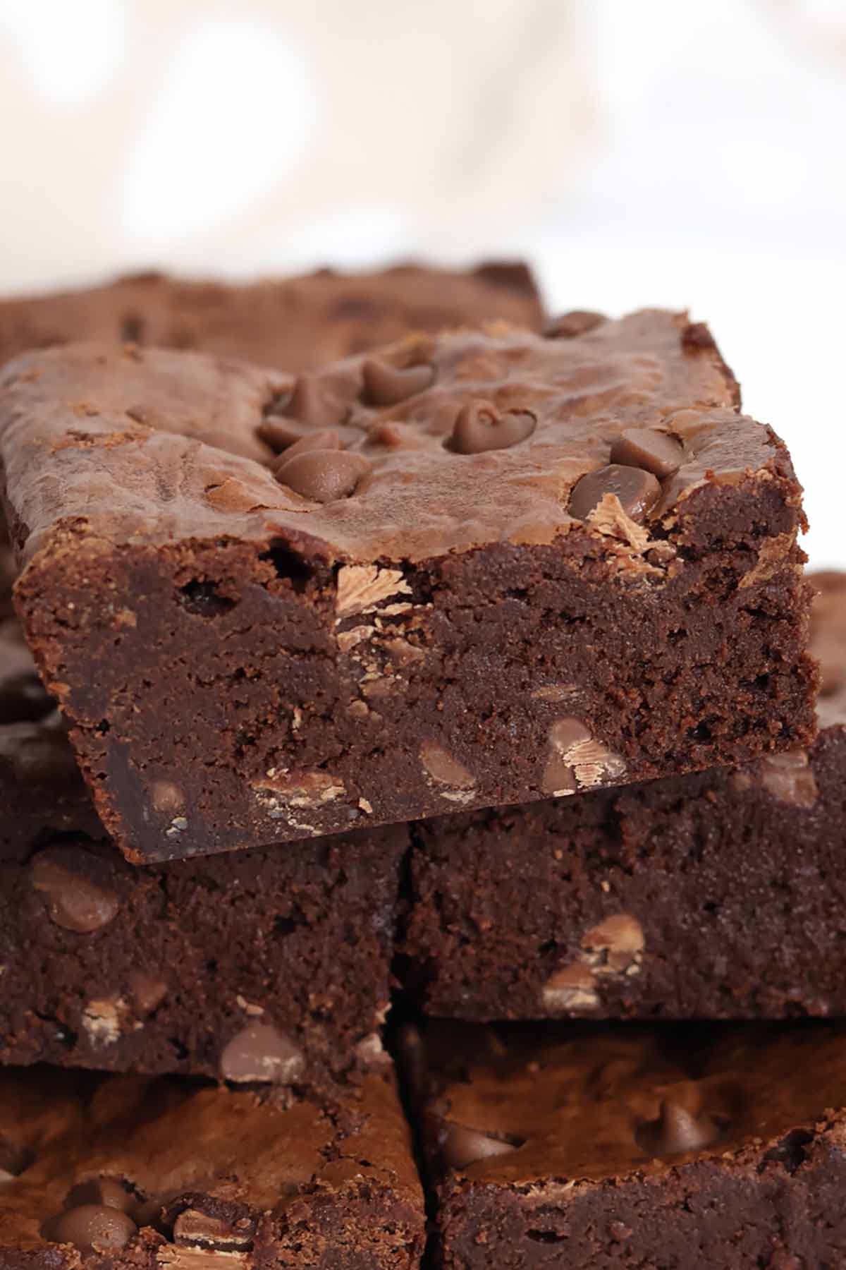 close up of a stack of brown sugar brownies on a plate