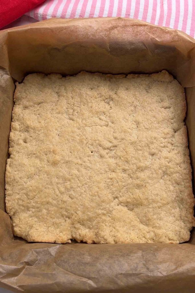 baked shortbread base in tin