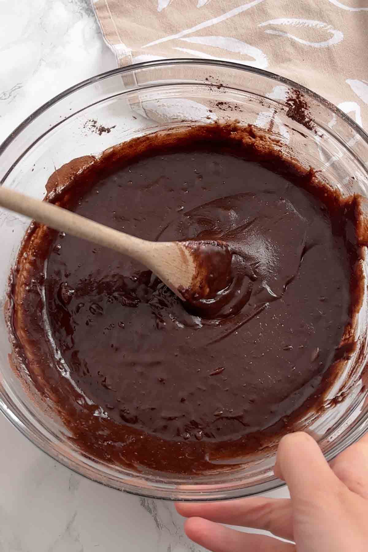 a glass bowl full of batter