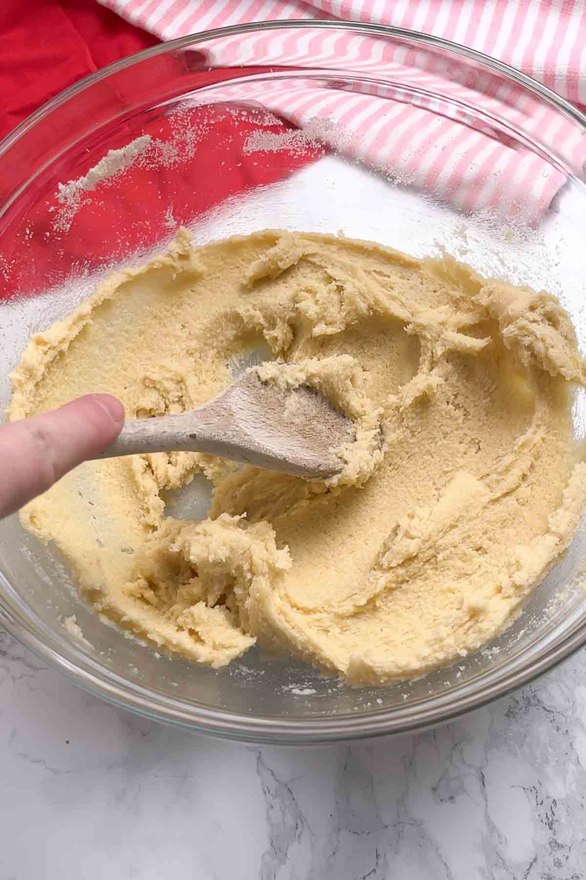 butter and sugar creamed together in a glass bowl