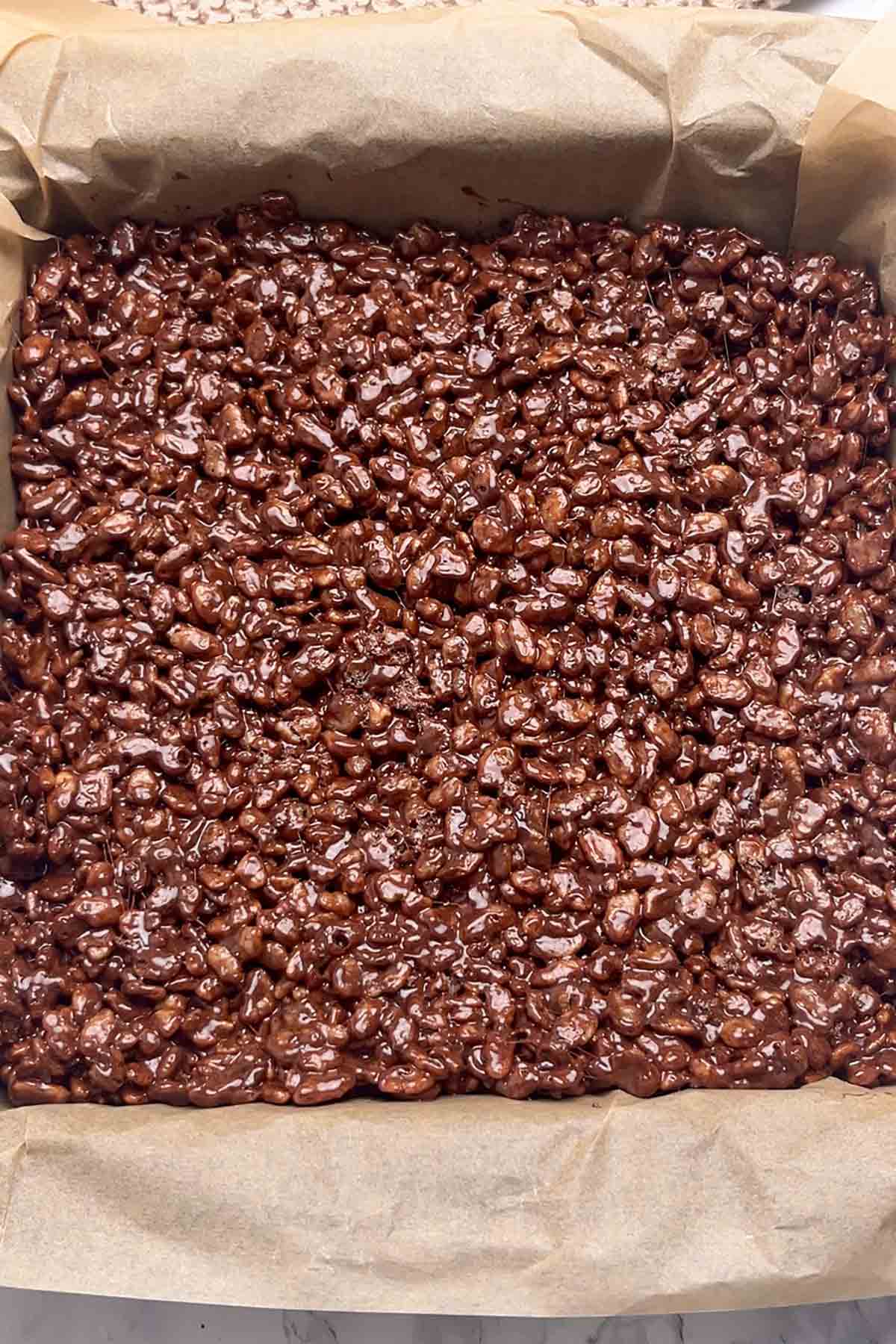 krispie mixture pressed into lined tin