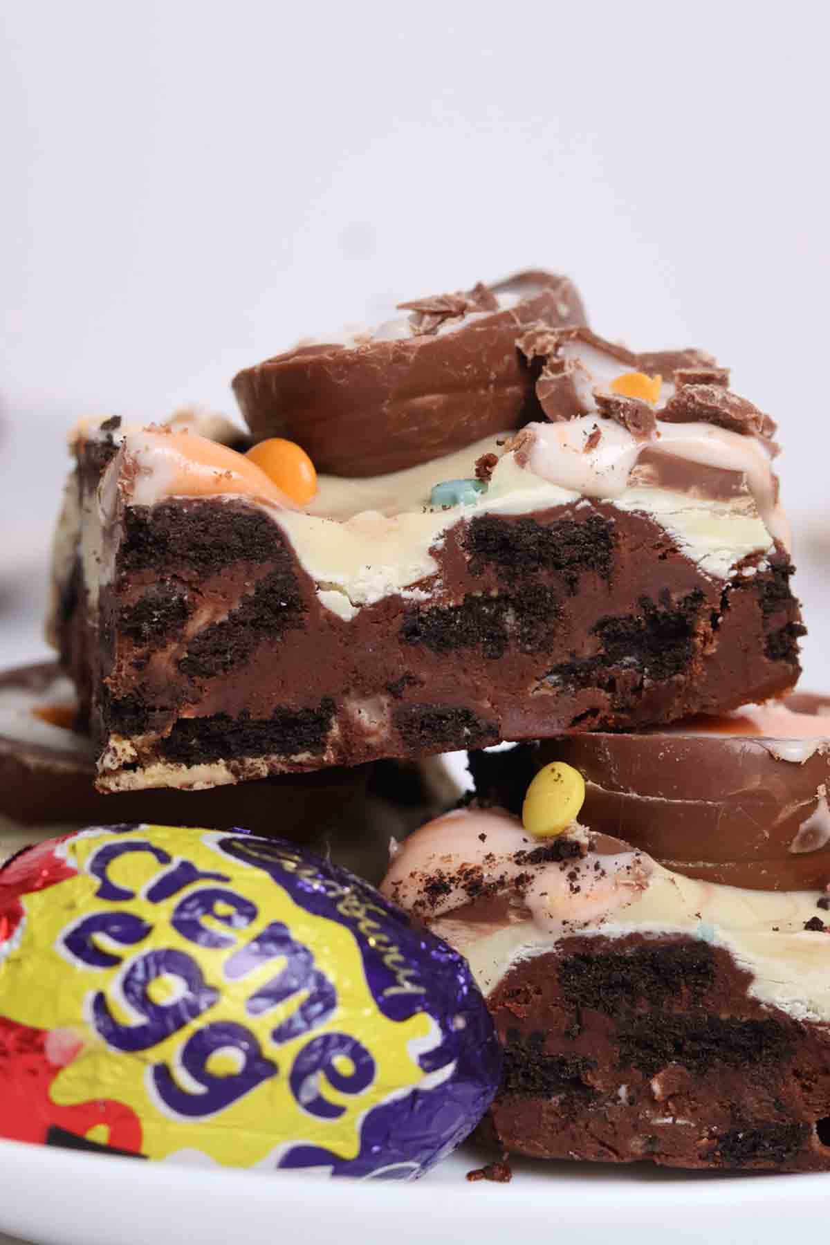 slices of no bake creme egg traybake on a plate